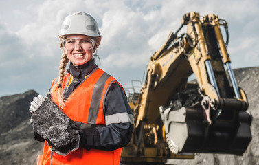 Worker with coal in the hands