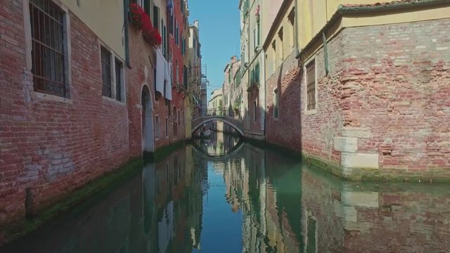 VENICE, ITALY - JUNE 19 2016: View of small canal in Venice