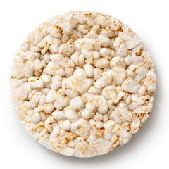 Puffed rice cake from above isolated on white.