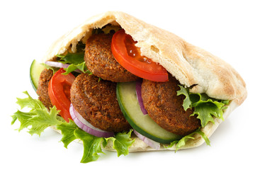 Pita bread filled with falafel and salad isolated on white. - 117893421