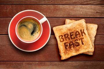 Breakfast, coffee and toast with the text breakfast, on a wood background