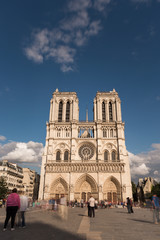 Notre Dame de Paris. France. Ancient catholic cathedral on the quay of a river Seine. Famous touristic architecture landmark in spring
