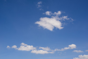 Obraz premium Clouds in a bright summer sky