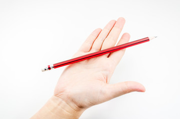 Red pencil  on hand woman on white background