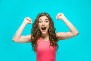 The young woman's portrait with happy emotions