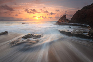 Beautiful sunset in Azkorri beach (Bizkaia, Basque Country) © inakibo