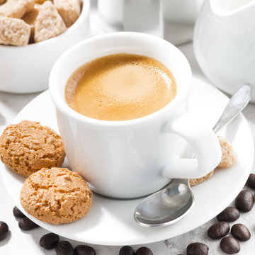 cup of espresso and cookies