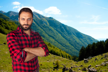 Naklejka premium Mountain man with plaid shirt