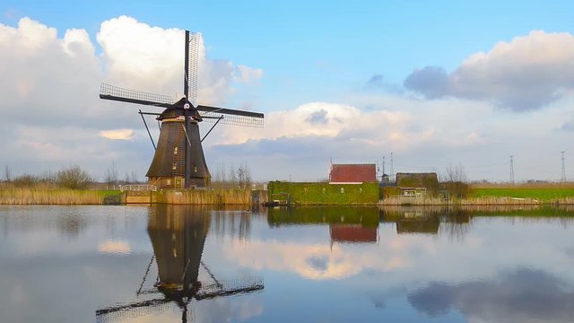 Dutch Windmills at sunset in the famous kinderdijk, Netherlands