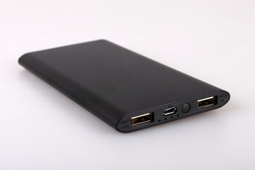 Black power bank for charging mobile devices