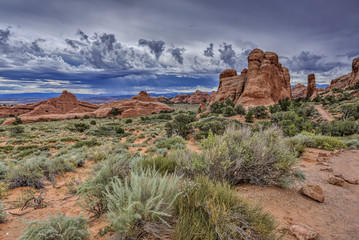 rain on the horizon at Arches National Park.