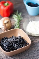 Ingredients for black pasta and vegetables