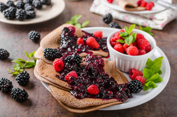 Cocoa pancakes with forest fruit