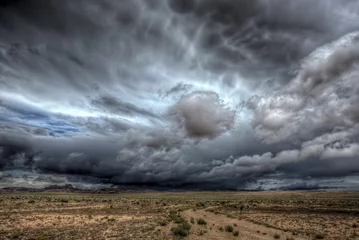 Foto op Plexiglas Onweer Een enorme onweersbui boven centraal Utah