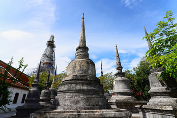 Fototapeta na wymiar Wat Phra Mahathat Woramahawihan Nakorsrithammarat Thailand against blue sky
