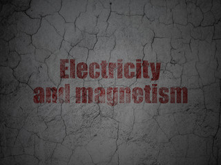 Science concept: Electricity And Magnetism on grunge wall background