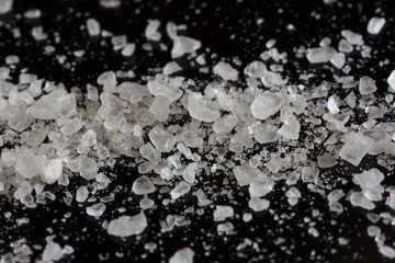 sea salt crystals on the black background