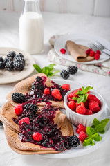 Cocoa pancakes with forest fruit