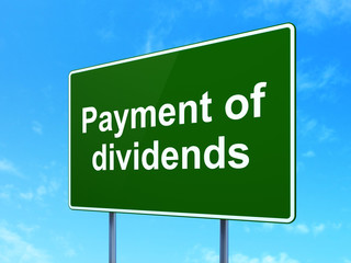 Money concept: Payment Of Dividends on road sign background