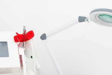 Beauty improvement concept. Cosmetology laser equipment in cabin