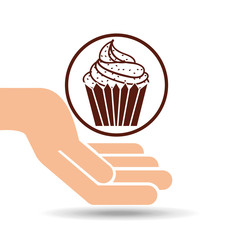 hand holding cupcake