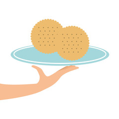 hand holding a tray of cookie