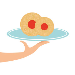 hand holding a tray of dessert