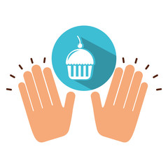 two hands holding cupcake