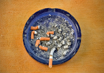 Ashtray and cigarette