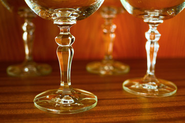 Empty glassware for wine. Beautiful stemglass with decoration and ornaments. Highlighting of contours and shape of glass. Shallow focus
