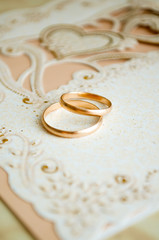 Thin wedding rings on the table