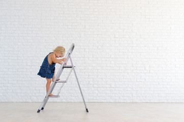 Girl on the ladder