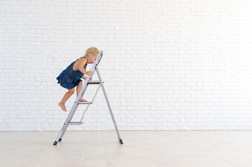 Girl on the ladder