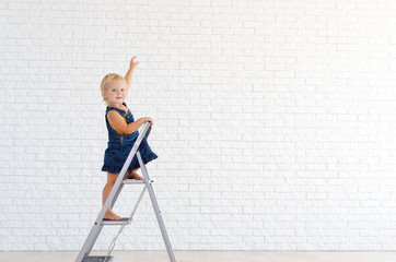 Girl on the ladder