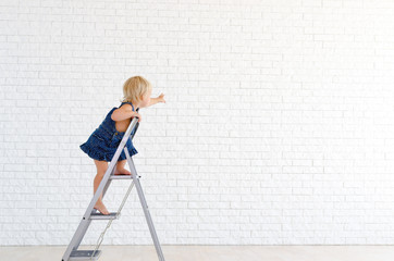 Girl on the ladder