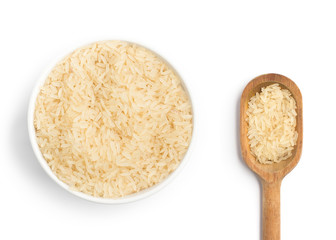Raw Rice into a bowl and spoon