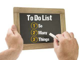 Hand writing To Do List on chalkboard