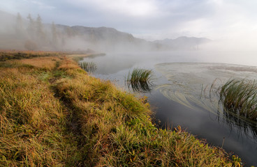 Early morning on Yazevoe lake in Altai mountains, Kazakhstan 