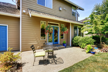 Backyard view of large American house.