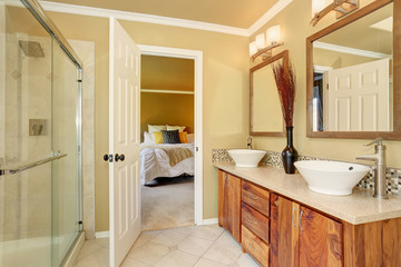 Luxurious bathroom interior in warm beige color