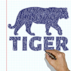 Tiger drawn with a pen. Hand painting tiger school notebook