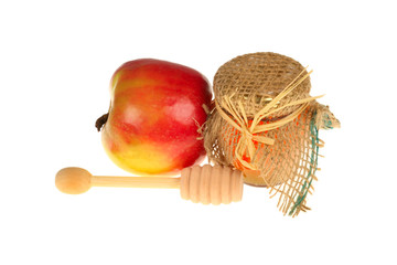 Honey and apple on white
