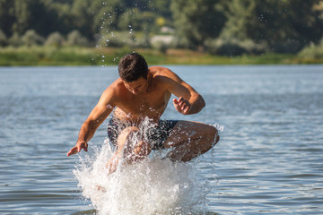 Man jumps out of the water