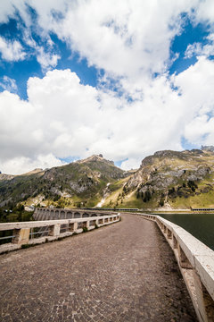 Lake Fedaia and dam at the foot of Marmolada mountain