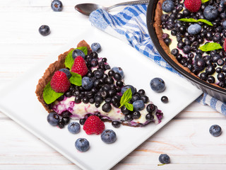 Delicious tart with blueberries and raspberries