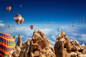Hot air balloons, hand carved rooms in rocks, two running horses