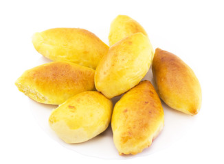 Fresh homemade cakes at plate isolated on white background