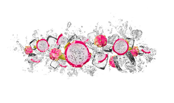 Fototapeta Dragon fruit in water splash on white background