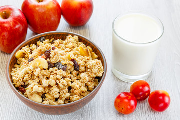 Muesli milk fruit on the table