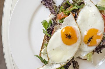 Oatmeal pancakes fresh orange juice coffee and scrambled eggs for breakfast  
